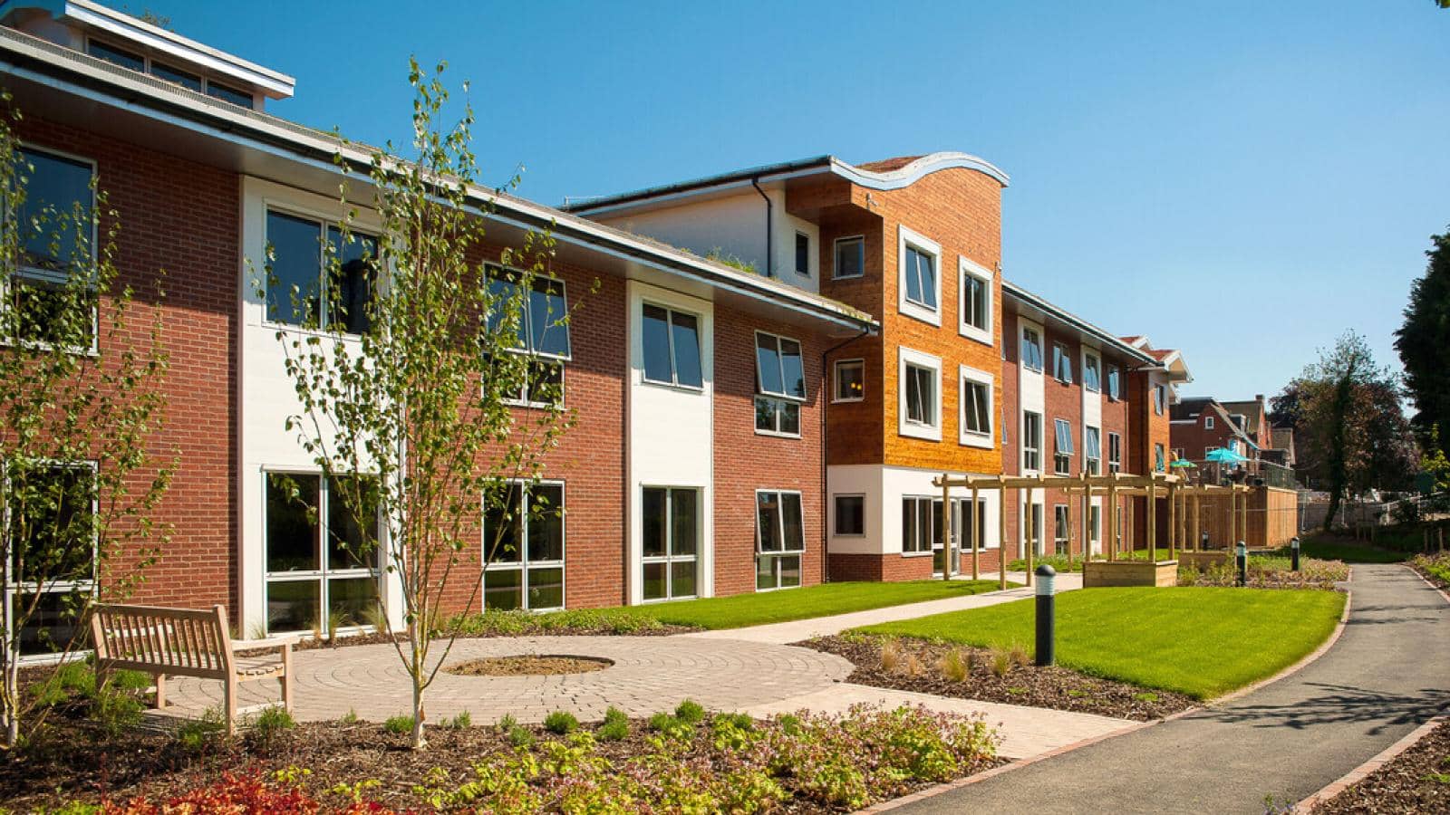 Aigburth care home in Oadby entrance in the summer sunshine